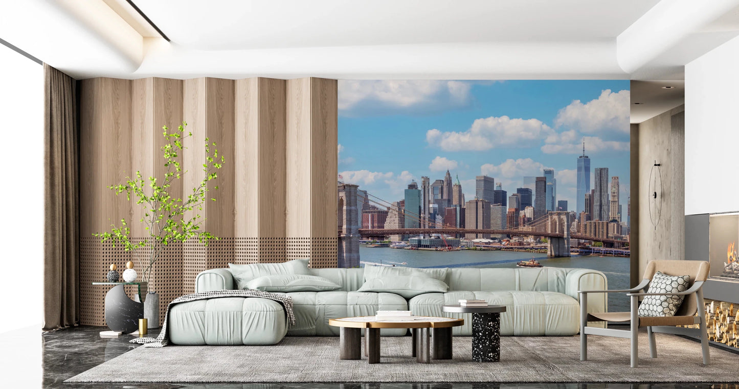 NYC Bridge Vista wallpaper mural of the city skyline above a sage green sectional in a wood-panelled living room