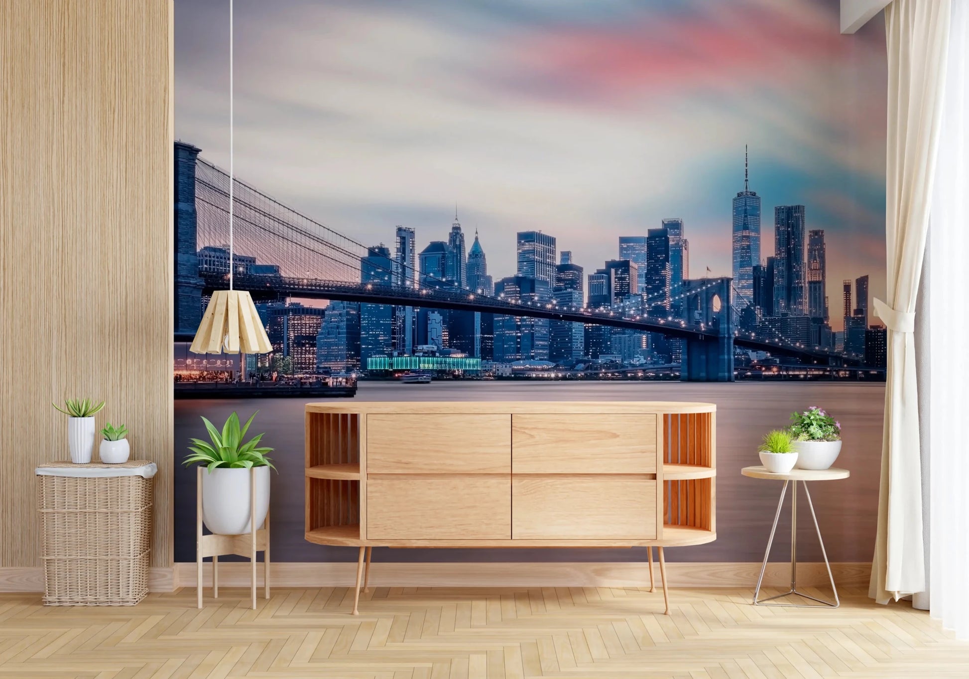 NYC Twilight Dreams wallpaper mural of the bridge at dusk above a light wood sideboard and potted plants