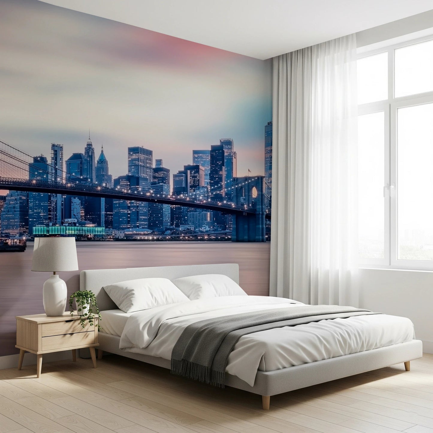 NYC Twilight Dreams wallpaper mural of Manhattan at twilight above a grey upholstered bed in a bright bedroom