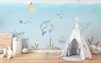 Ocean Explorer Watercolor wallpaper of narwhals, a yellow submarine and whale in a kids room with a white teepee