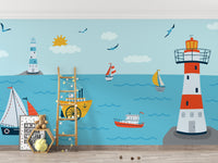 Ocean with Lighthouse and Boat wallpaper mural styled along a hallway feature wall near a console in blue tones
