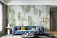 An angled shot of a wall with olive wallpaper

