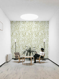 An angled shot of a wall with floral wallpaper

