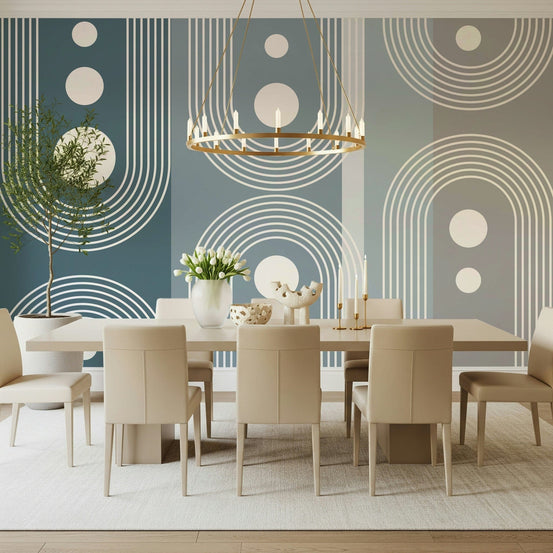 Orbital Arches wallpaper mural in blue-grey arches and white dots behind a beige dining table and chandelier