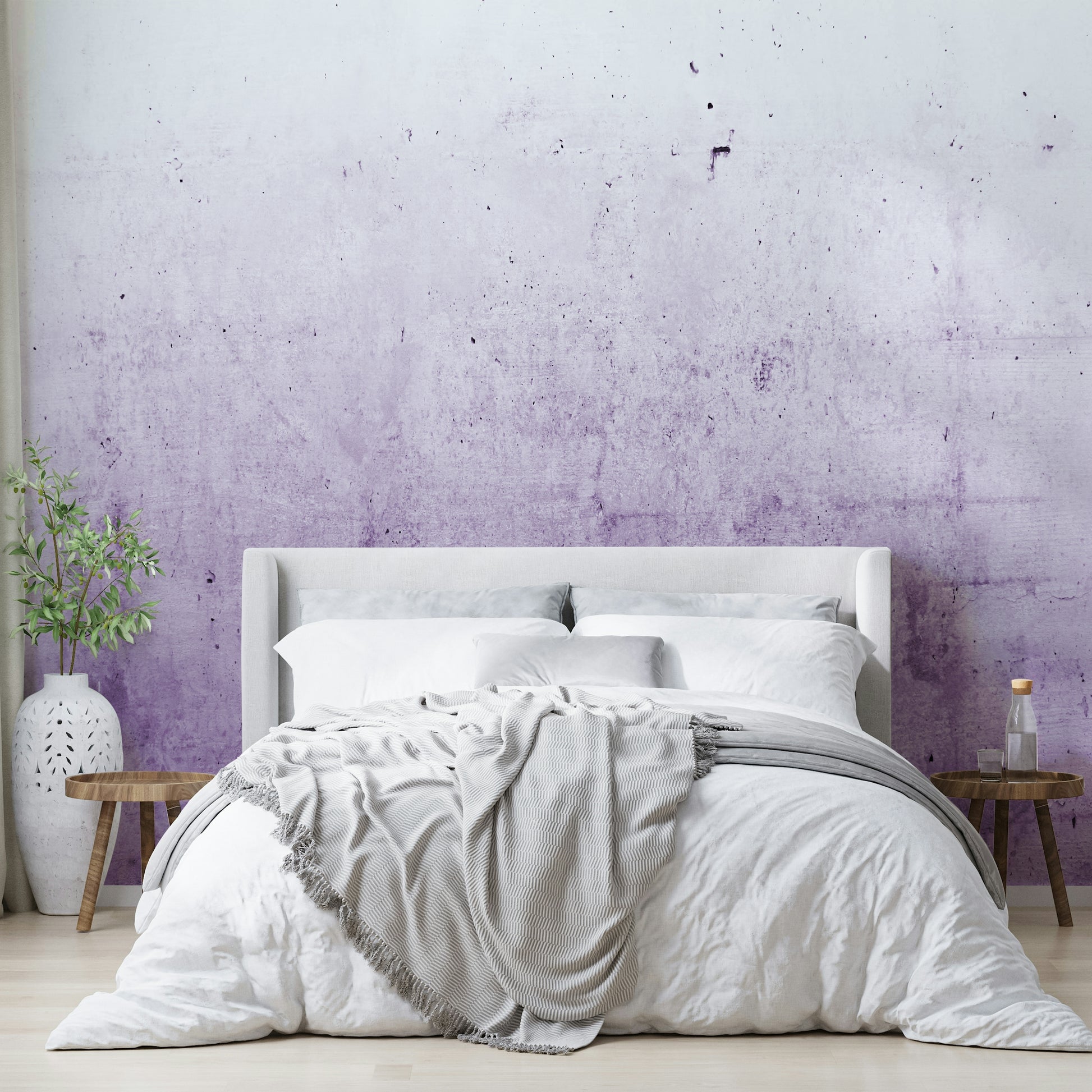 Wall mural with a radiant orchid ombre on a concrete texture.

