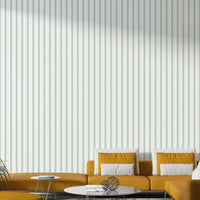 A calming light sage design wallpaper mural that defines a space.


