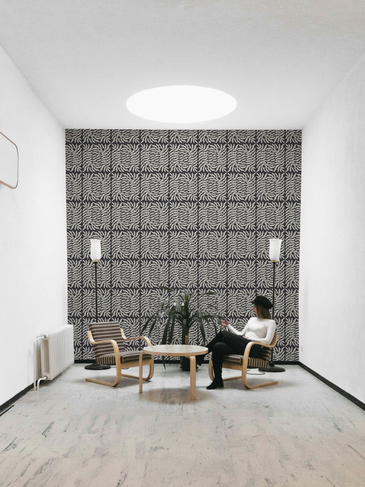 Minimalist taupe wallpaper with botanical ferns

