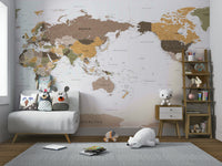 Pacific Centered Travel Map wallpaper mural over a white loveseat with owl pillows and a polar bear toy