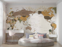 Pacific Centered Travel Map wallpaper mural in a bedroom with a round bed and pink desk and chair