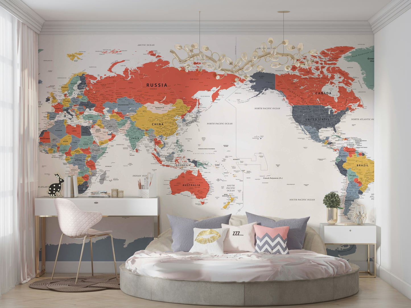 Pacific Centered World Map in Happy Colors wallpaper mural in a bedroom with a round bed and pink desk chair