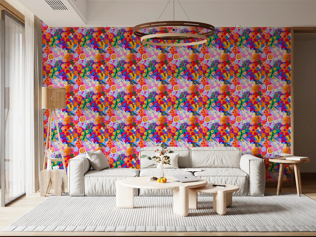 Painted Garden Bloom Spring Colorful Flowers living room Wallpaper with vibrant blue backdrop.