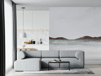 Ocean shoreline mural in reading nook, gentle color tones, minimalist decor