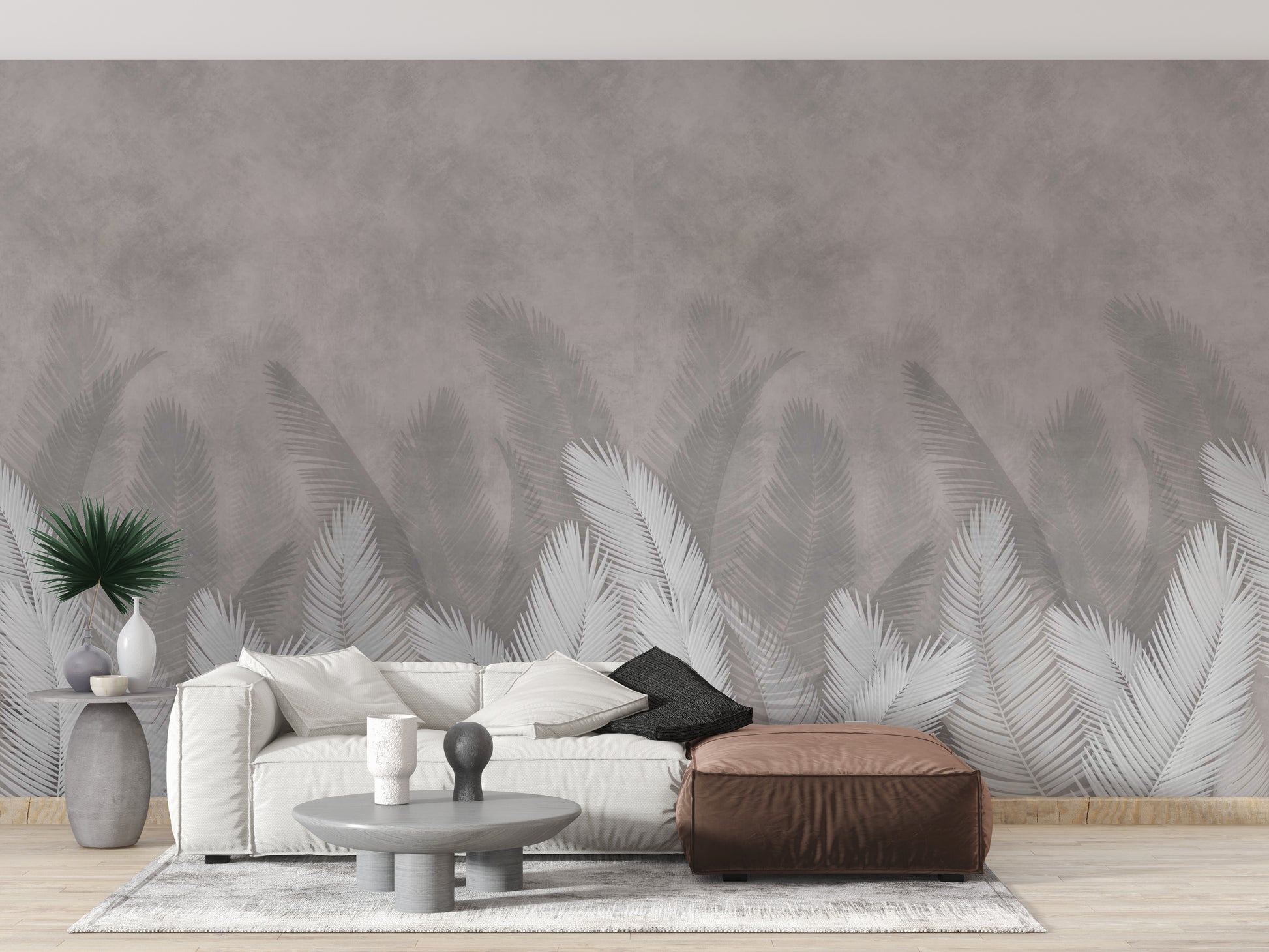 Palm leaves with gray color wallpaper mural styled along a hallway feature wall near a console in white tones