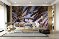Tropical scenery wall mural with palm trees and soft, dreamy sky colors.