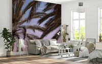Nature-inspired wall covering featuring palms swaying under a peaceful sky.