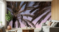 Sunset-inspired palm mural creating a tranquil, beachy atmosphere.