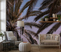 Tropical wall mural with palm silhouettes and calming sky tones for relaxing interiors.