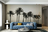 Nature-inspired wall mural featuring palms and ocean in the background

