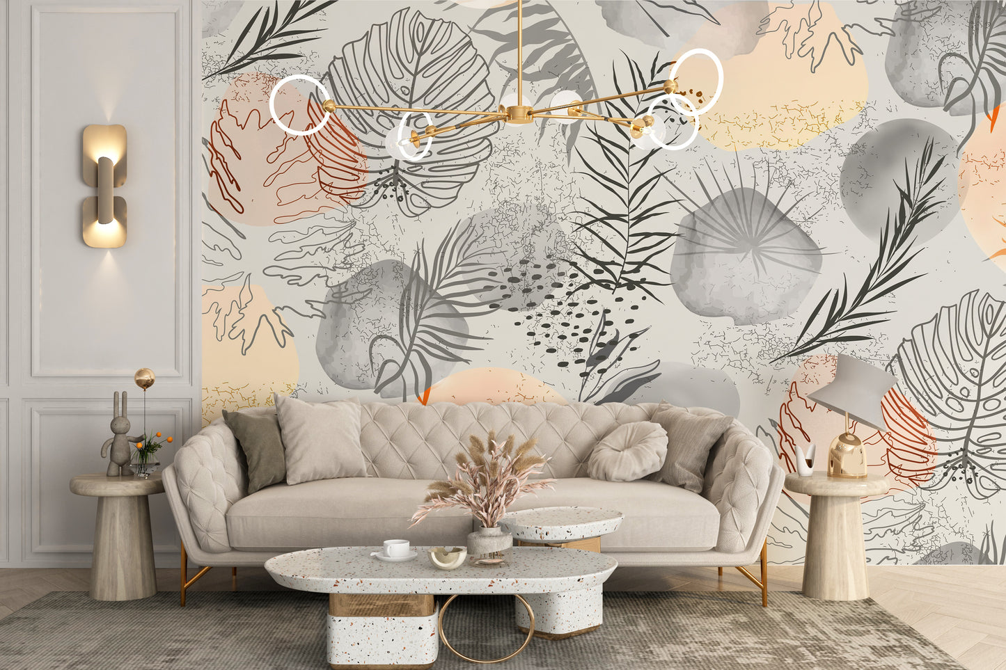 Palm tropical leaves wallpaper mural of grey and peach line-art foliage above a beige tufted sofa