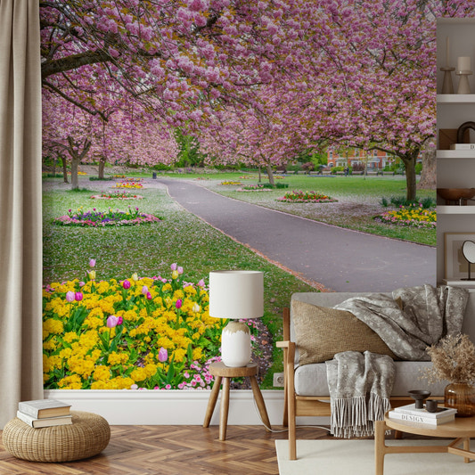 Vibrant park wallpaper with pink blossoms

