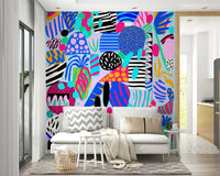 Abstract wallpaper featuring a dynamic mix of shapes, dots, and stripes in vivid festive colors.
