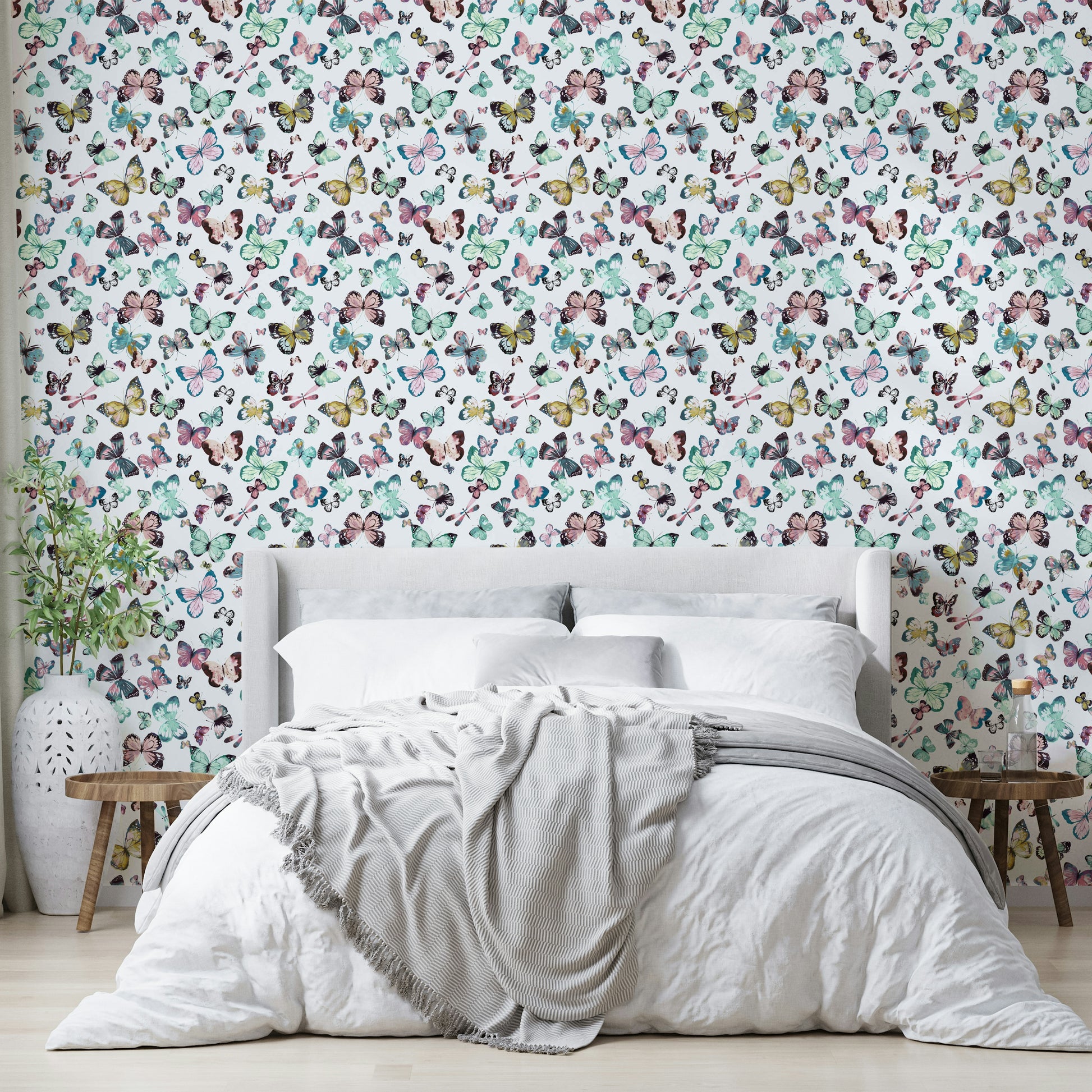 Watercolor flying butterfly wallpaper in soft colors

