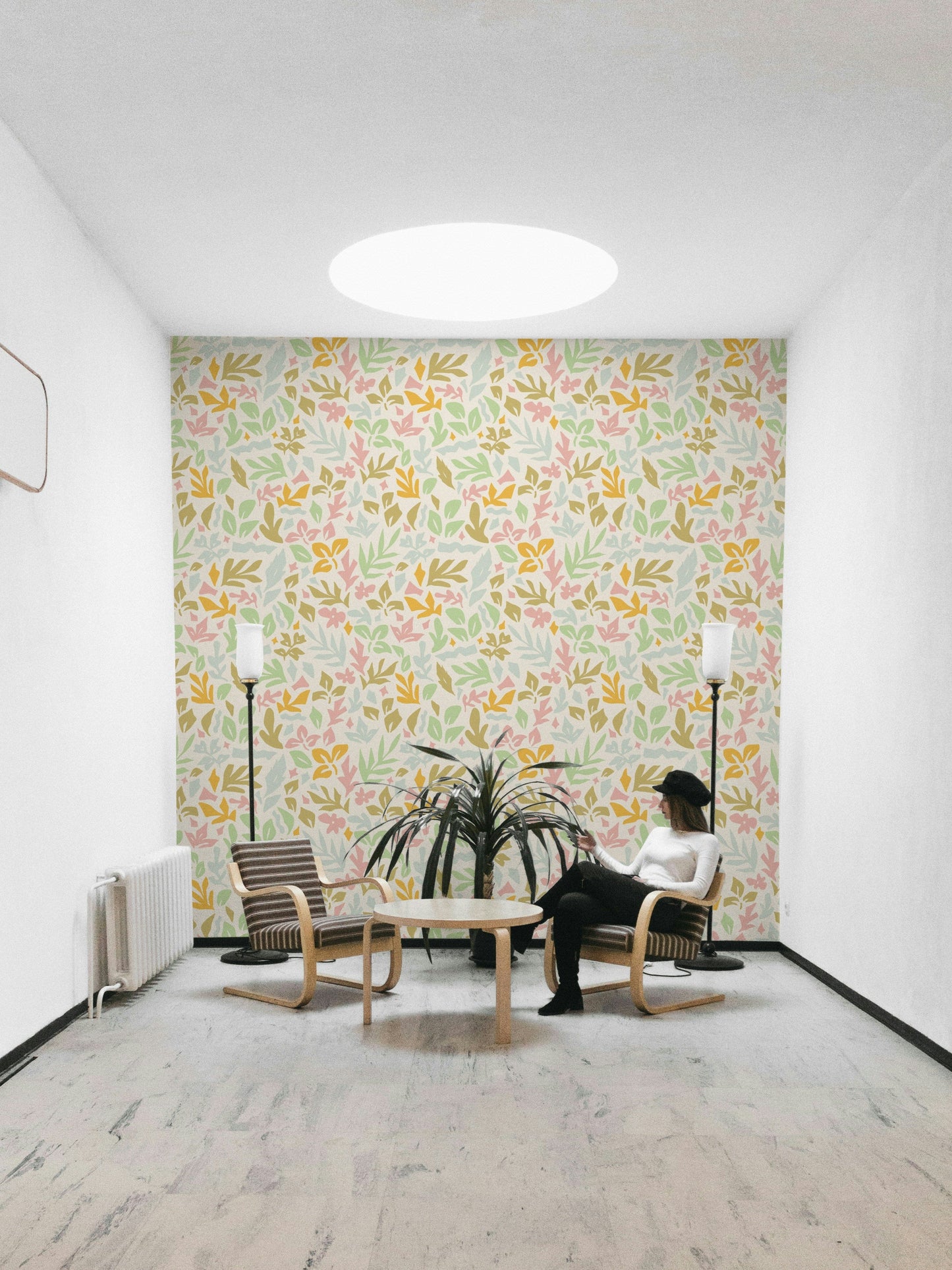 The shapes are inspired by botanical elements like leaves and stems.
