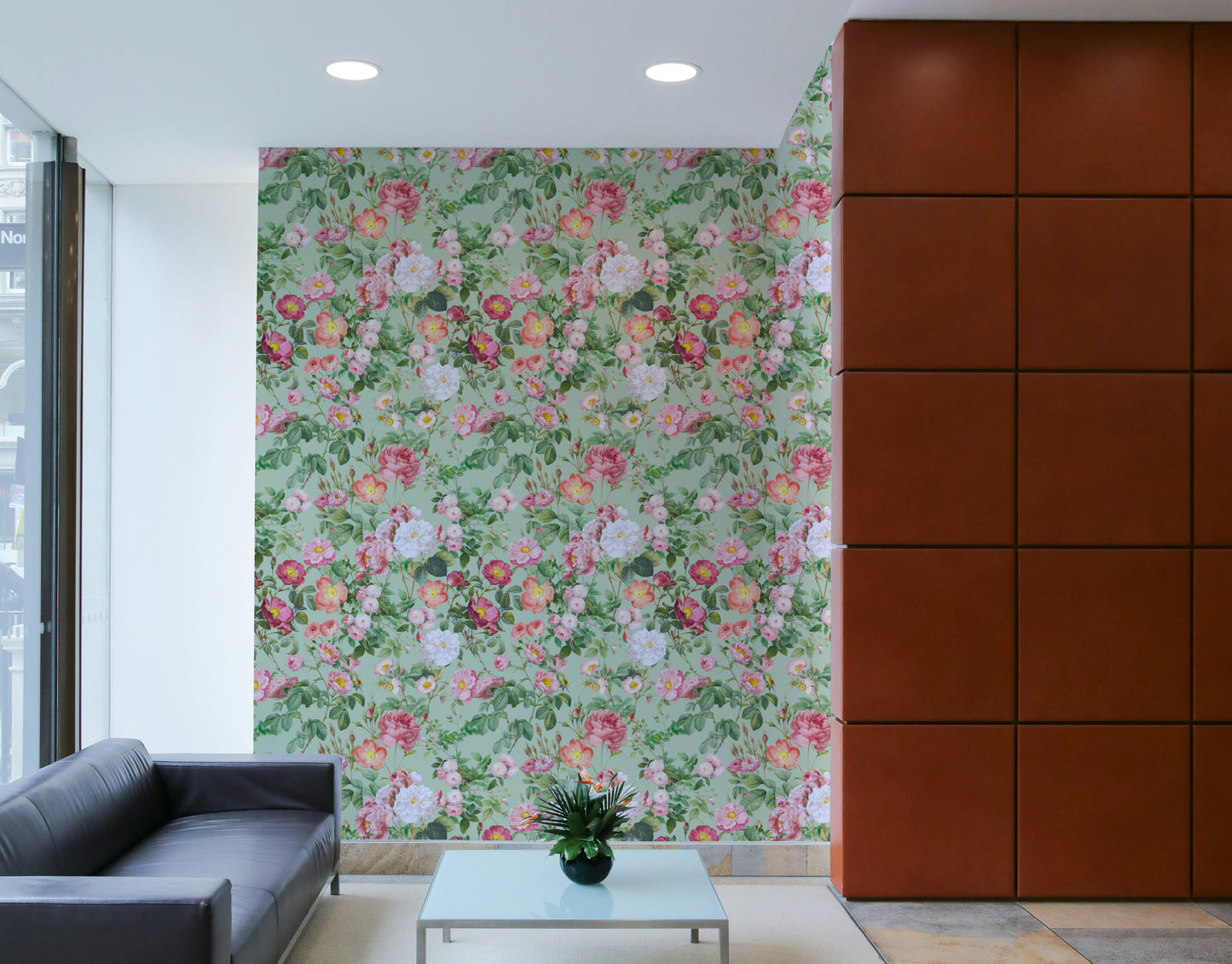 Gentle floral wallpaper mural with pastel roses and light greenery.

