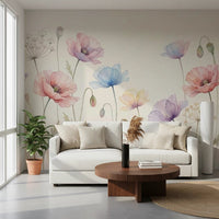 Pastel Poppy Field wallpaper mural of large watercolor poppies behind a white sofa and round walnut coffee table