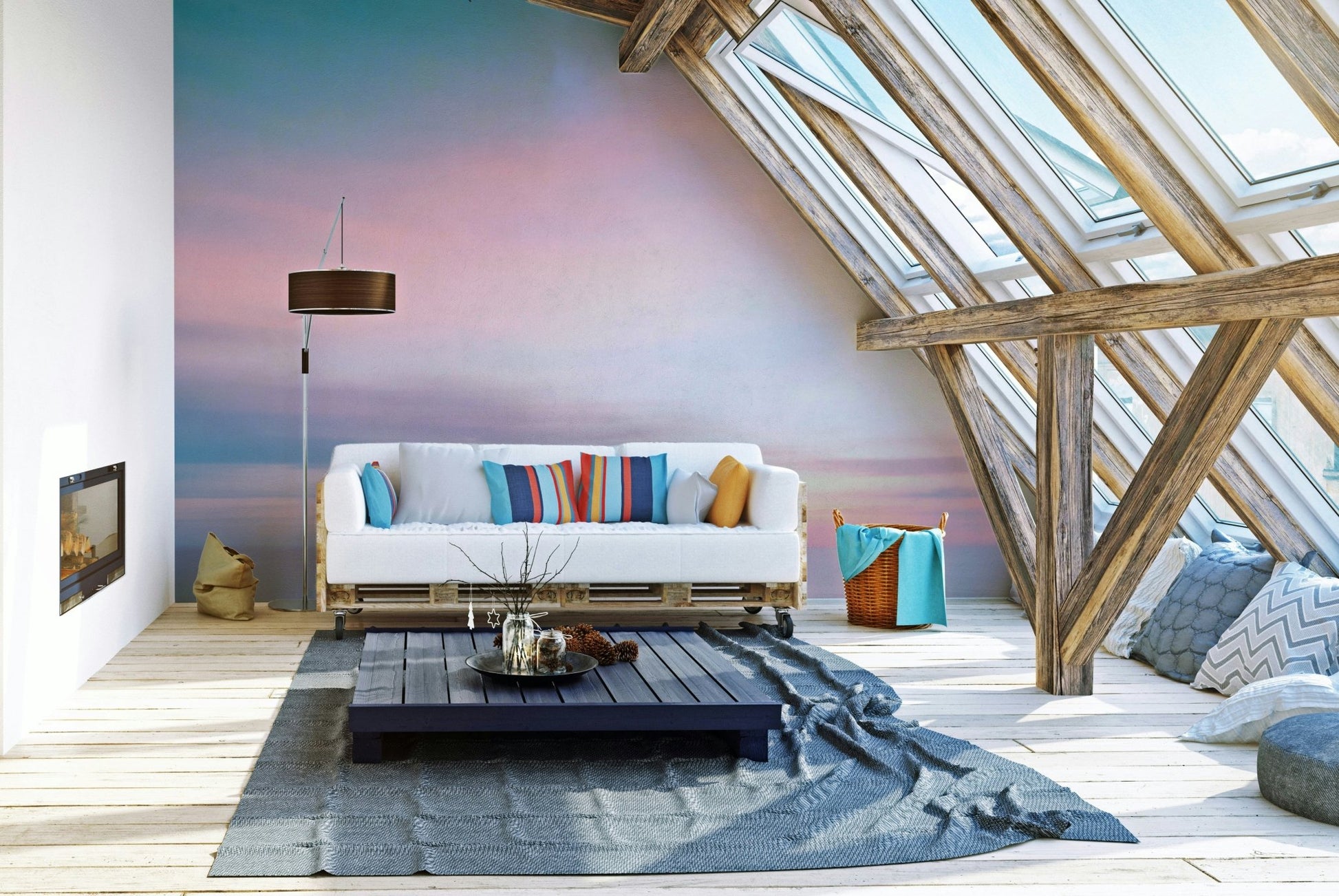 Pastel Serenity wallpaper mural of a pink and blue sunset sea in an attic lounge with a white sofa and skylights