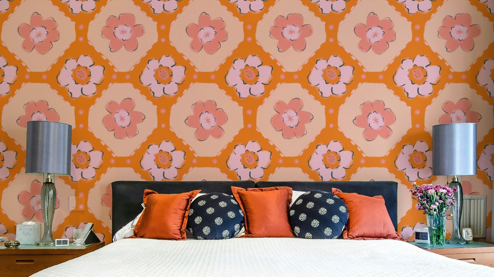 The image shows a repeating pattern of flowers and leaves.

