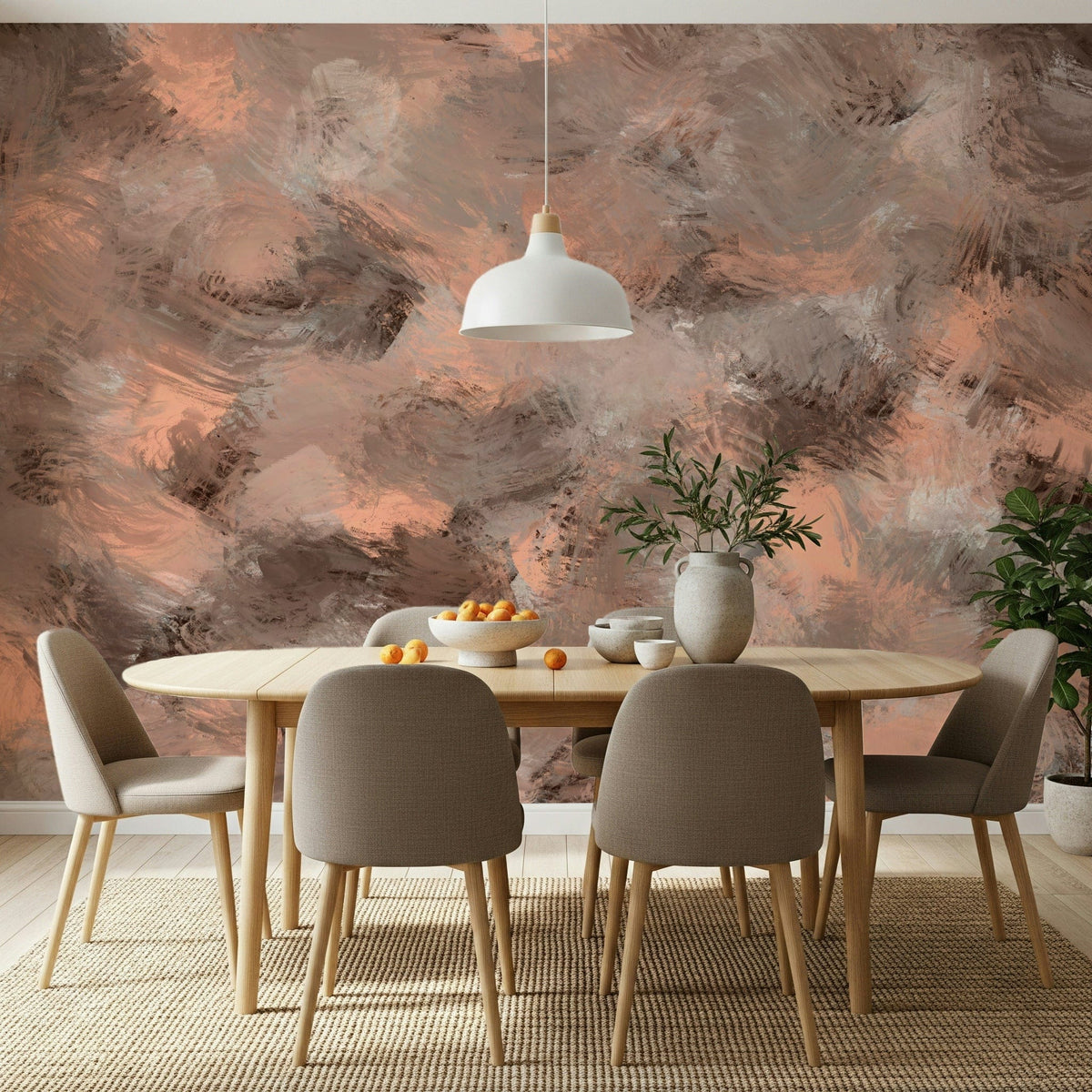 Subtle Canvas wallpaper mural of peach and grey brushstrokes behind an oval wood dining table and beige chairs