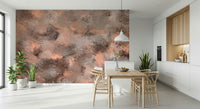 Subtle Canvas wallpaper mural of peach brushstrokes beside a white kitchen and wood table with wishbone chairs