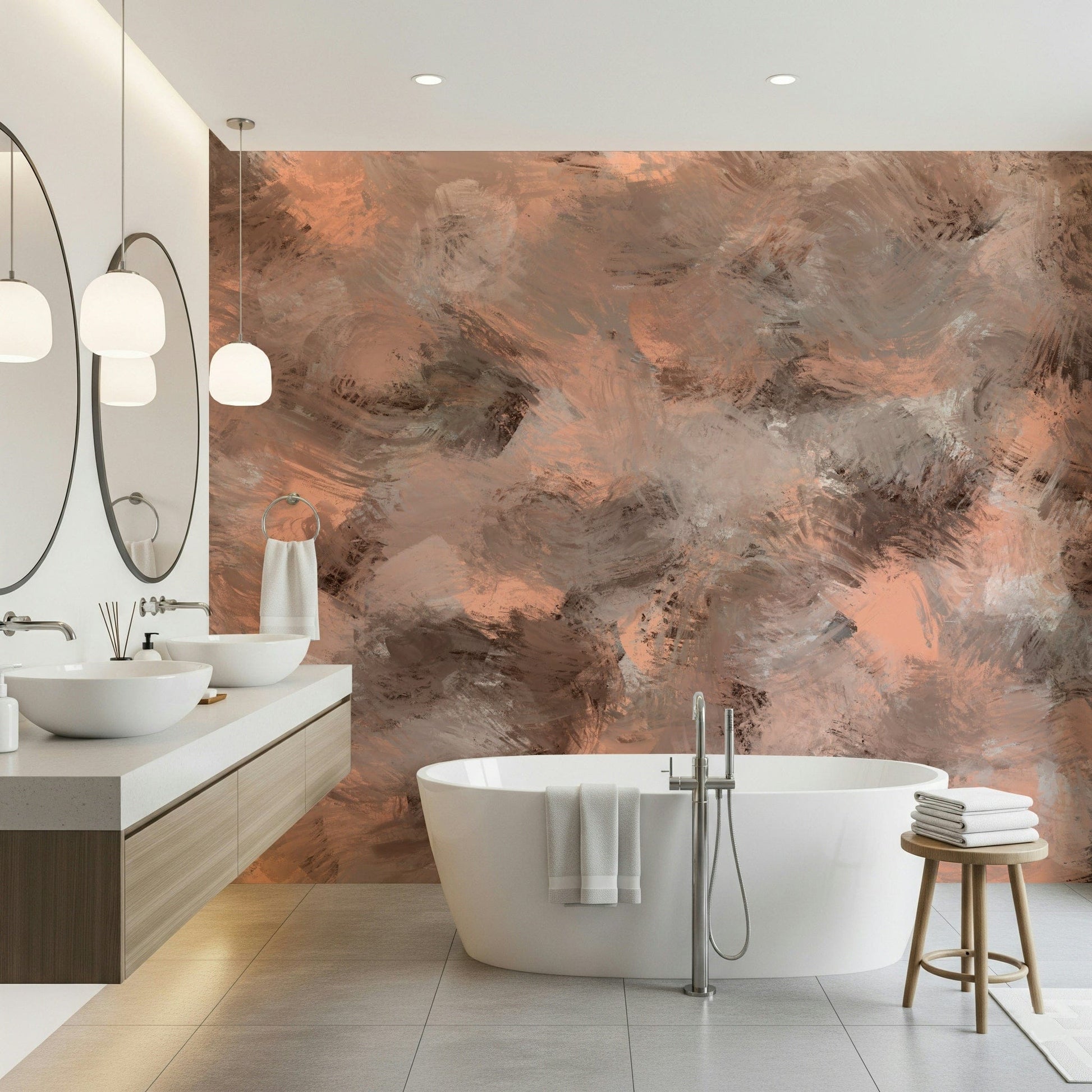 Subtle Canvas wallpaper mural of peach brushstrokes behind a freestanding white tub and double vanity in a bathroom