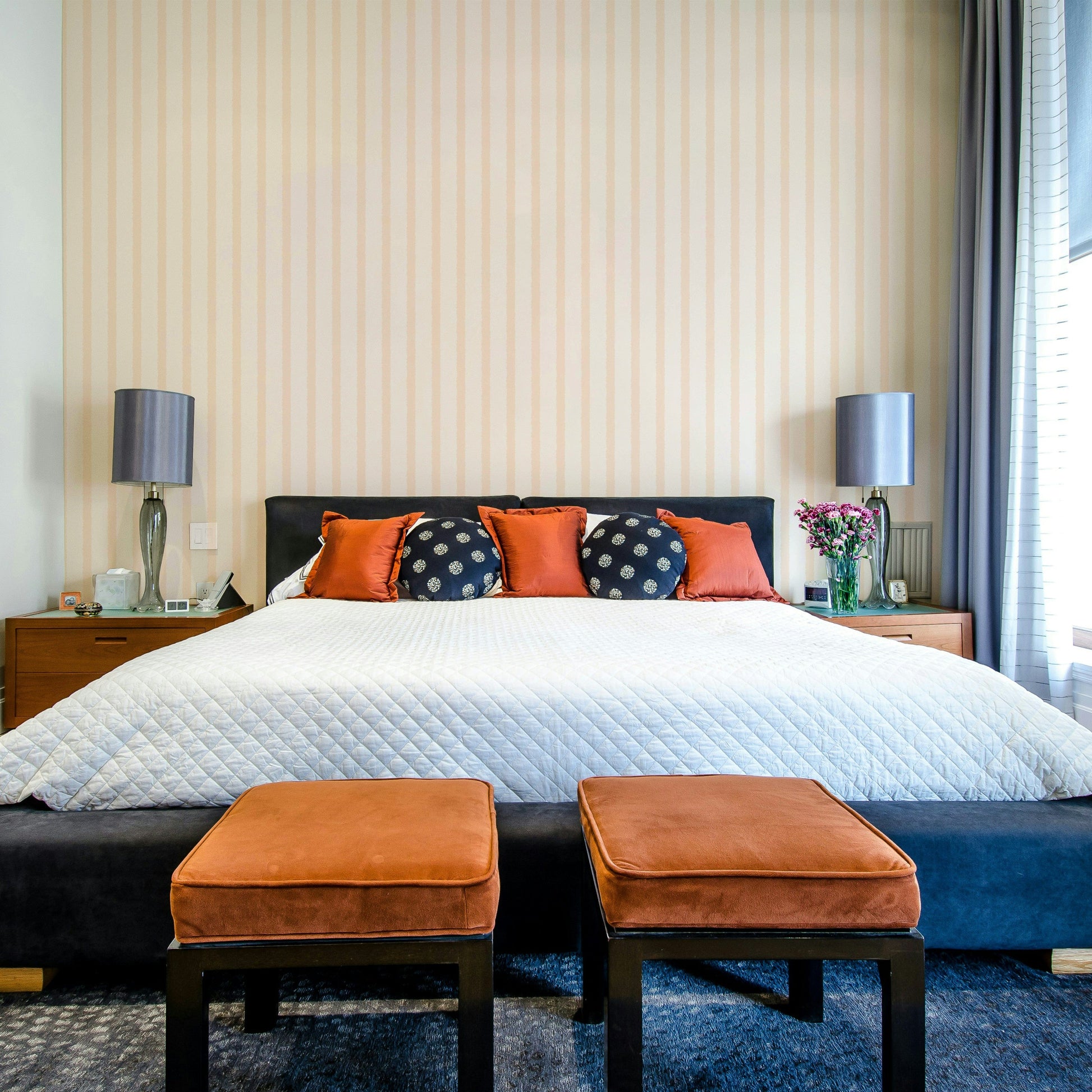 A graceful subtle pattern wall mural in soft, peach tones.

