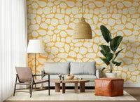 Cream stone shapes wallpaper on warm base