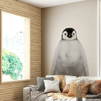 Cute penguin wall mural for playful interiors

