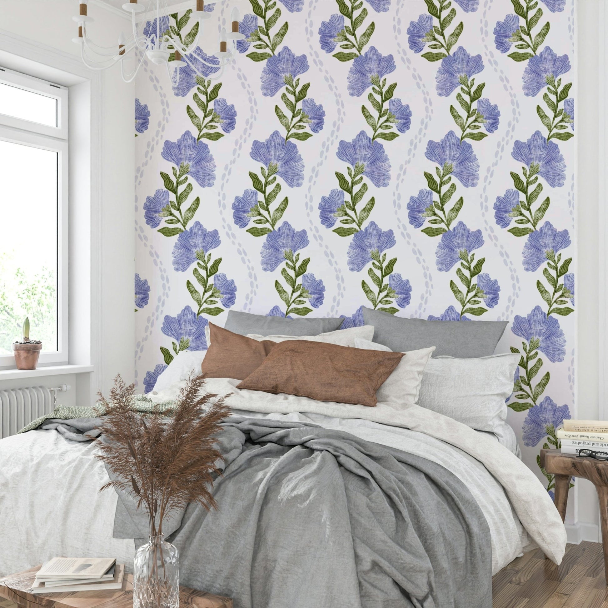 The image shows a repeating pattern of soft, periwinkle-colored flowers.

