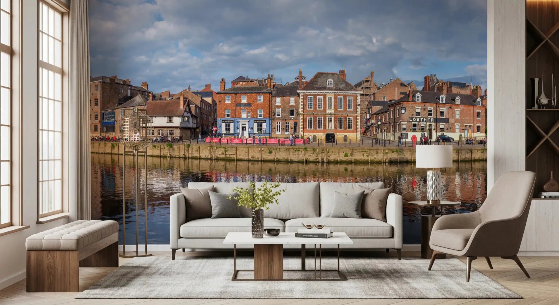 Picturesque Riverfront Wall Mural with blue skies and soft clouds