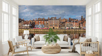 Picturesque Riverfront Wall Mural with vibrant building reflections