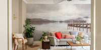Pier on the lake mural with autumn trees and misty mountains.

