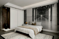 The style is photographic, with a strong focus on composition, light, and shadow in grayscale.
