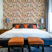 Copper pill shape mural in a Scandinavian-inspired style.

