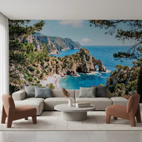Ocean cove wall mural in an office room with pine branches and coastal cliffs