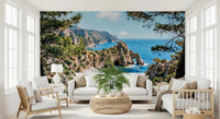 Scenic coastal wall mural with a sheltered cove, cliffs, and clear azure water