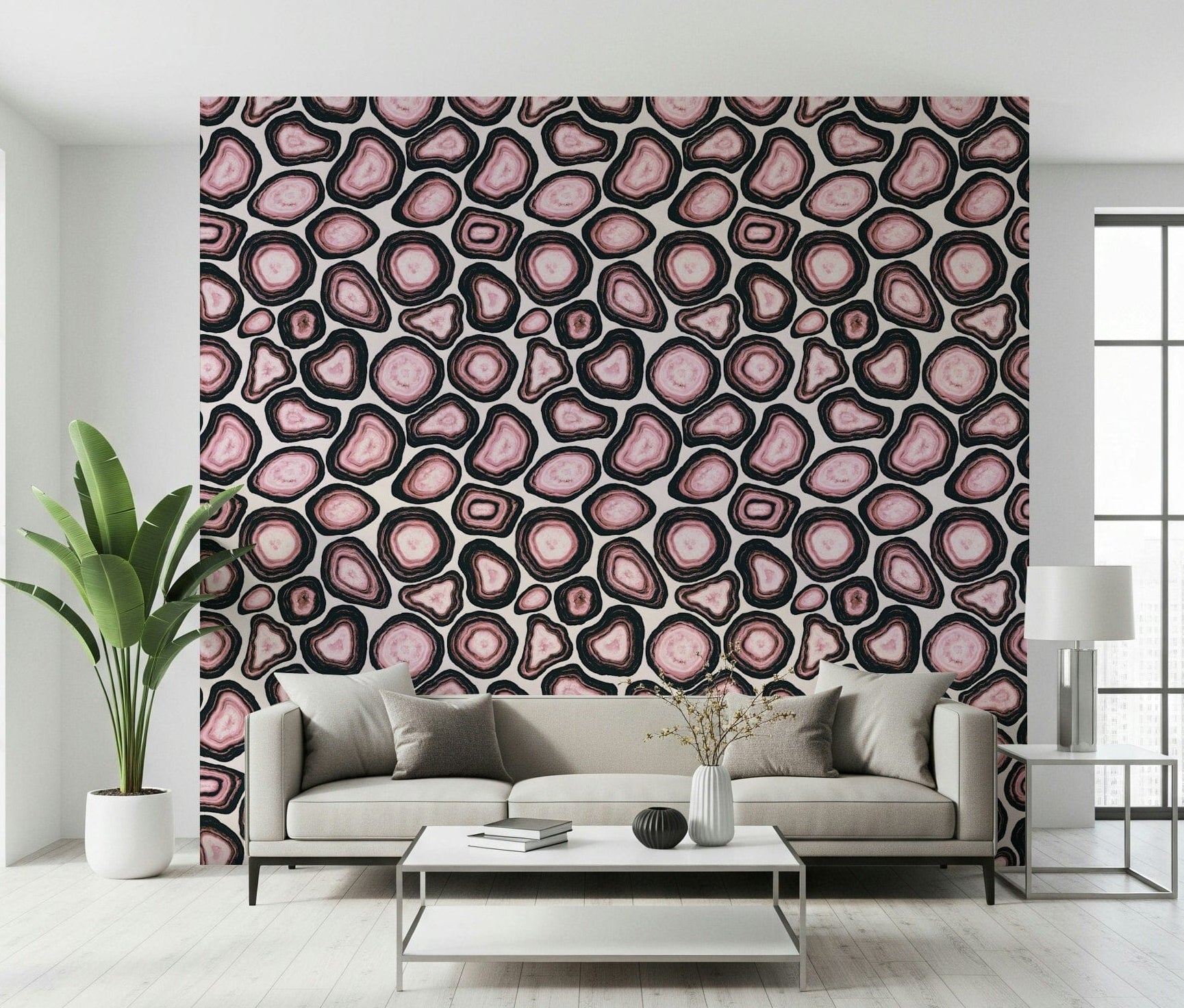 A pink agate wallpaper featuring layered stone-like patterns with rich mineral textures.