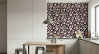 Pink mineral clusters arranged in an intricate agate-pattern wallpaper.
