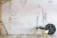 Pink Color Candy World wallpaper mural styled as a feature wall behind a dining table and chairs in pink tones