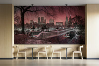 Dining area with a twilight city park backdrop.

