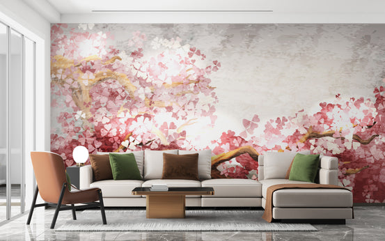 Pink Flower Sakura Branch wallpaper mural behind a cream sectional sofa and orange armchair in a living room